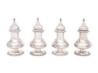 A Group of Sixteen Silver Casters
