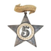 [Civil War]. A XII Corps badge of Captain James L. Thompson, 5th Ohio Volunteer Infantry.