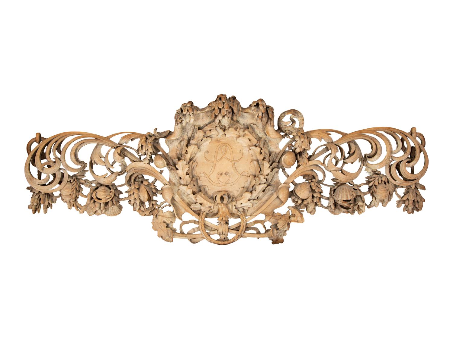 A French Carved Limewood Overdoor Panel Carved with Fruit, Flowers and Seashells