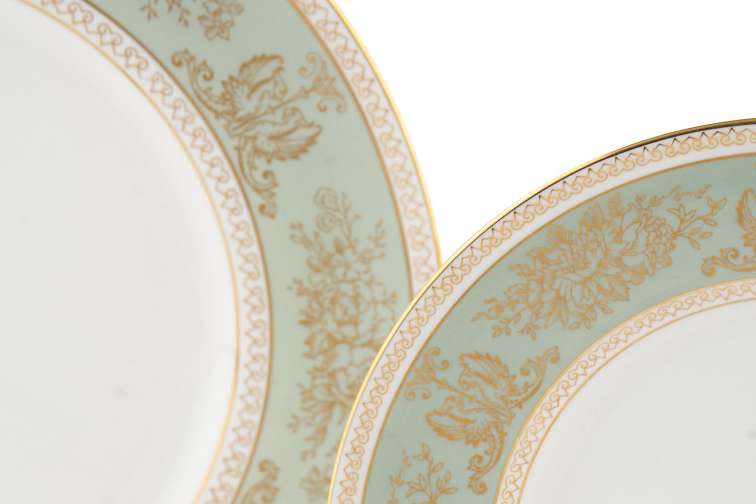 A Wedgwood Gold Columbia Porcelain Dinner Service