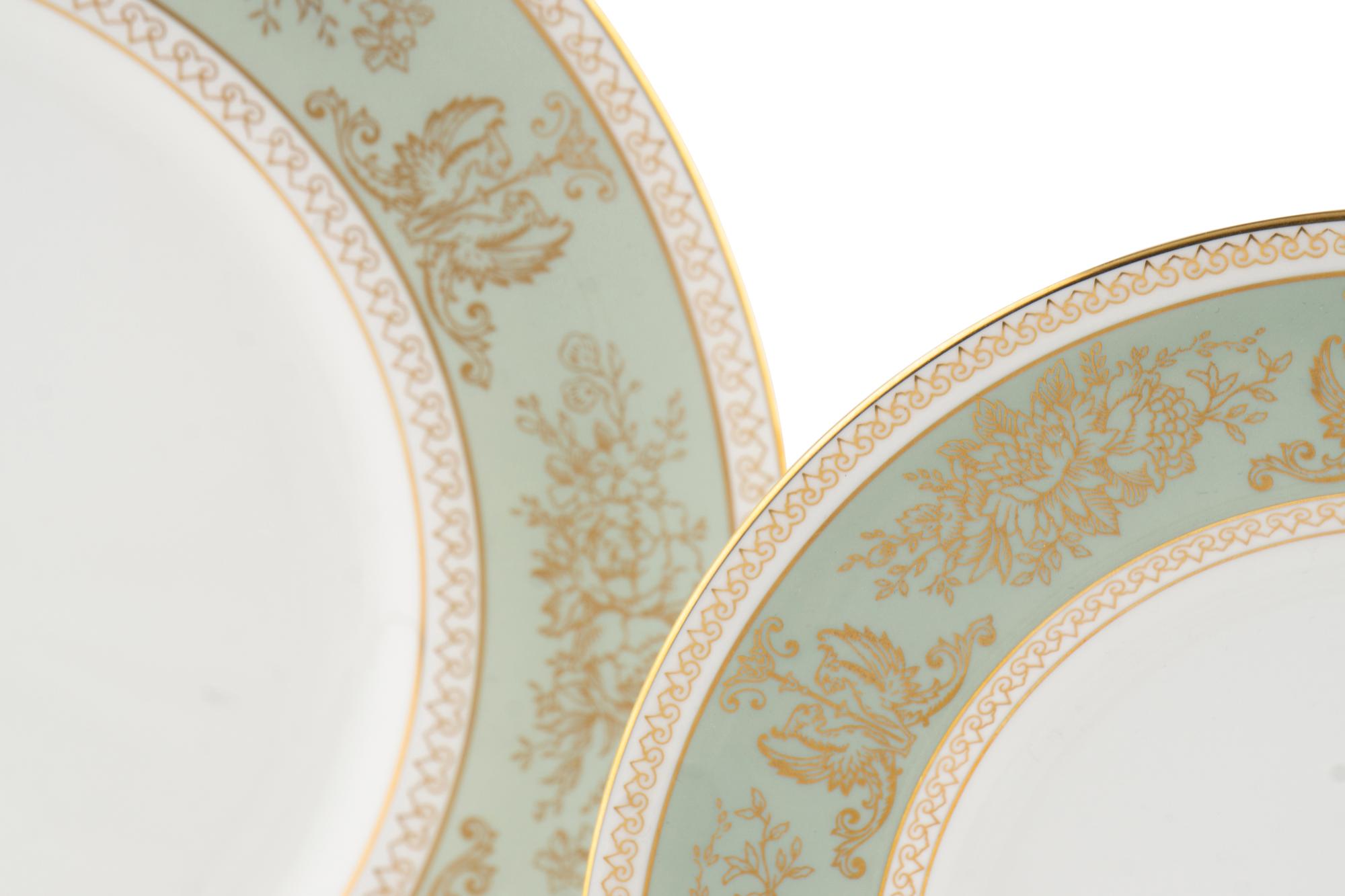 A Wedgwood Gold Columbia Porcelain Dinner Service
