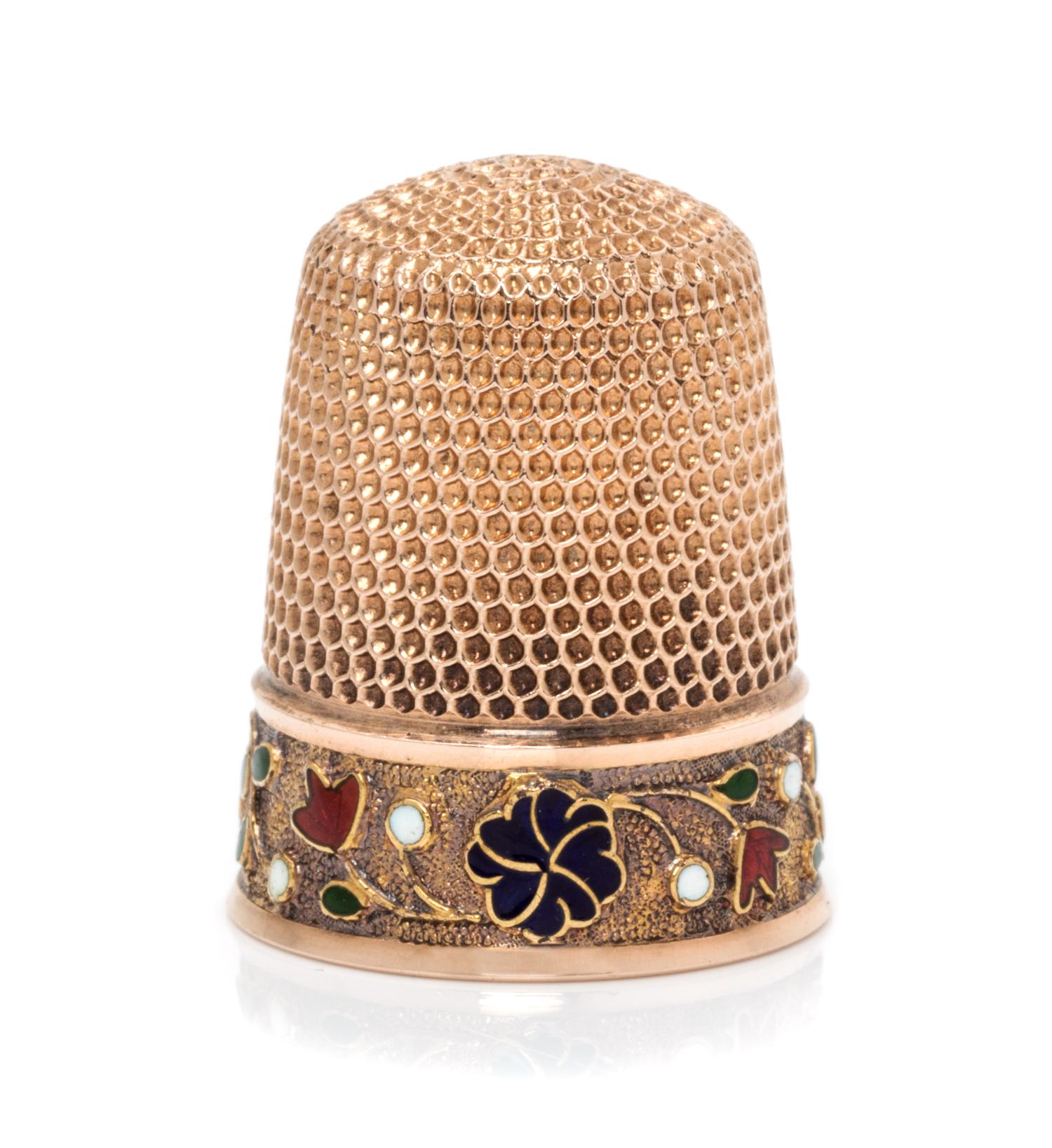 An American 14-Karat Rose Gold and Enamel Thimble, Simons Bros., Philadelphia, PA, the knurled top and body above a polychrome enamel f