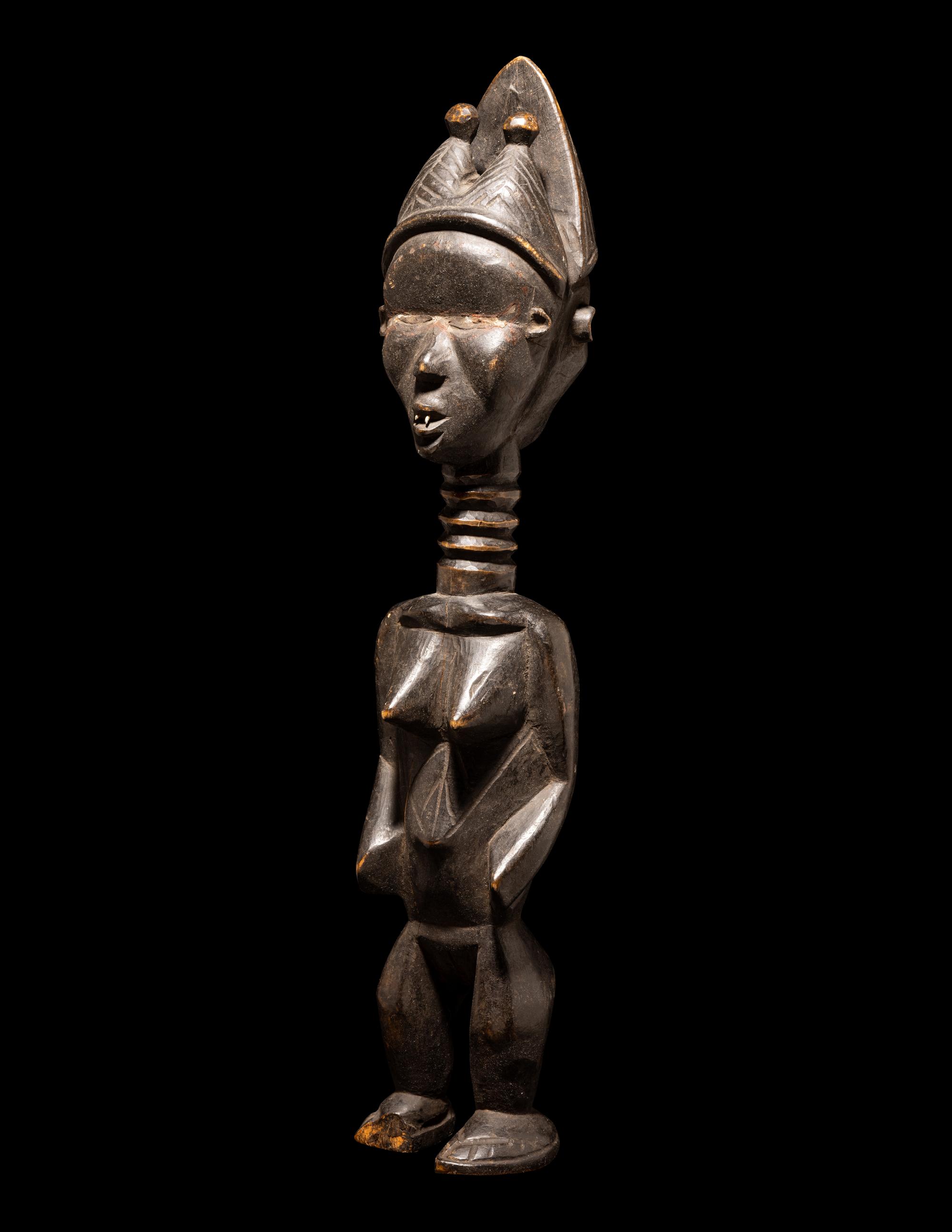 A Baule Wood Janus-Headed Figure