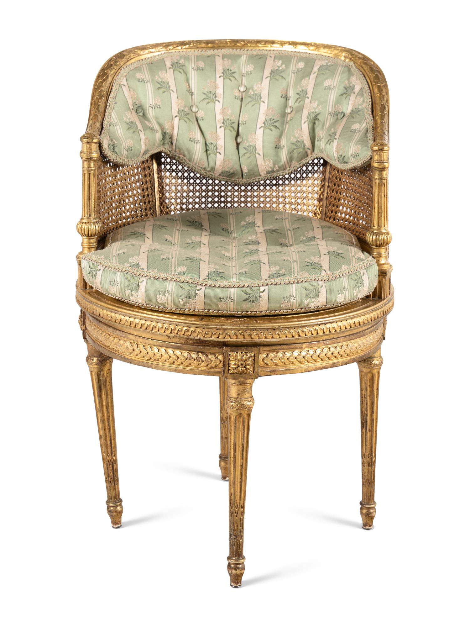 A Louis XVI Style Giltwood Bureau Bergère