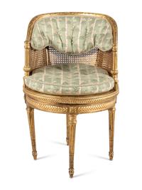 A Louis XVI Style Giltwood Bureau Bergère