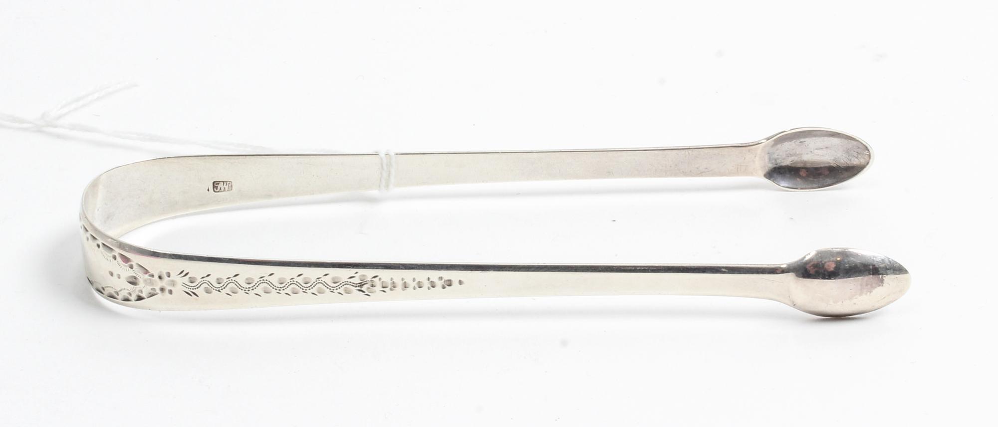 A George III Silver Sugar Tongs, Possibly John Whiting, London, 1800, the exterior decorated with wrigglework and foliate motifs.