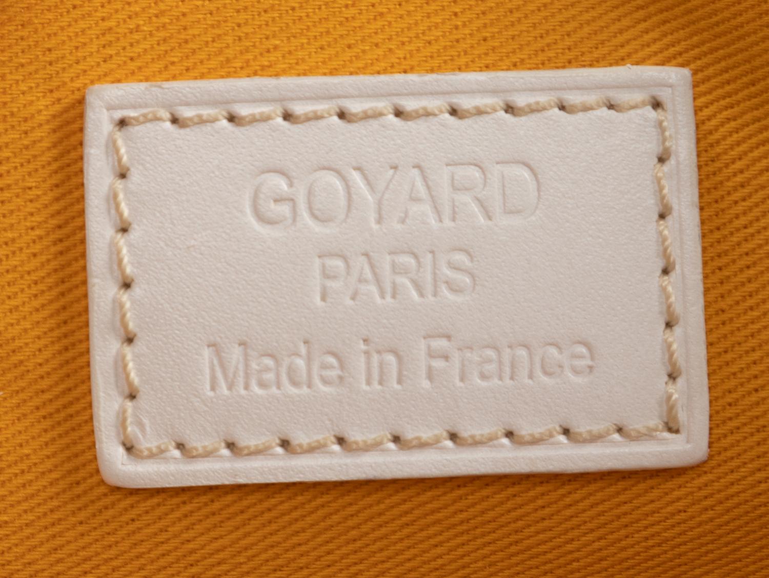 Six Goyard Items: Two Totes, Three Pouches, and One Wallet
