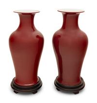 A Pair of Chinese Red Glazed Vases on Stands