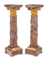 A Pair of Continental Gilt Bronze Mounted Marble Pedestals