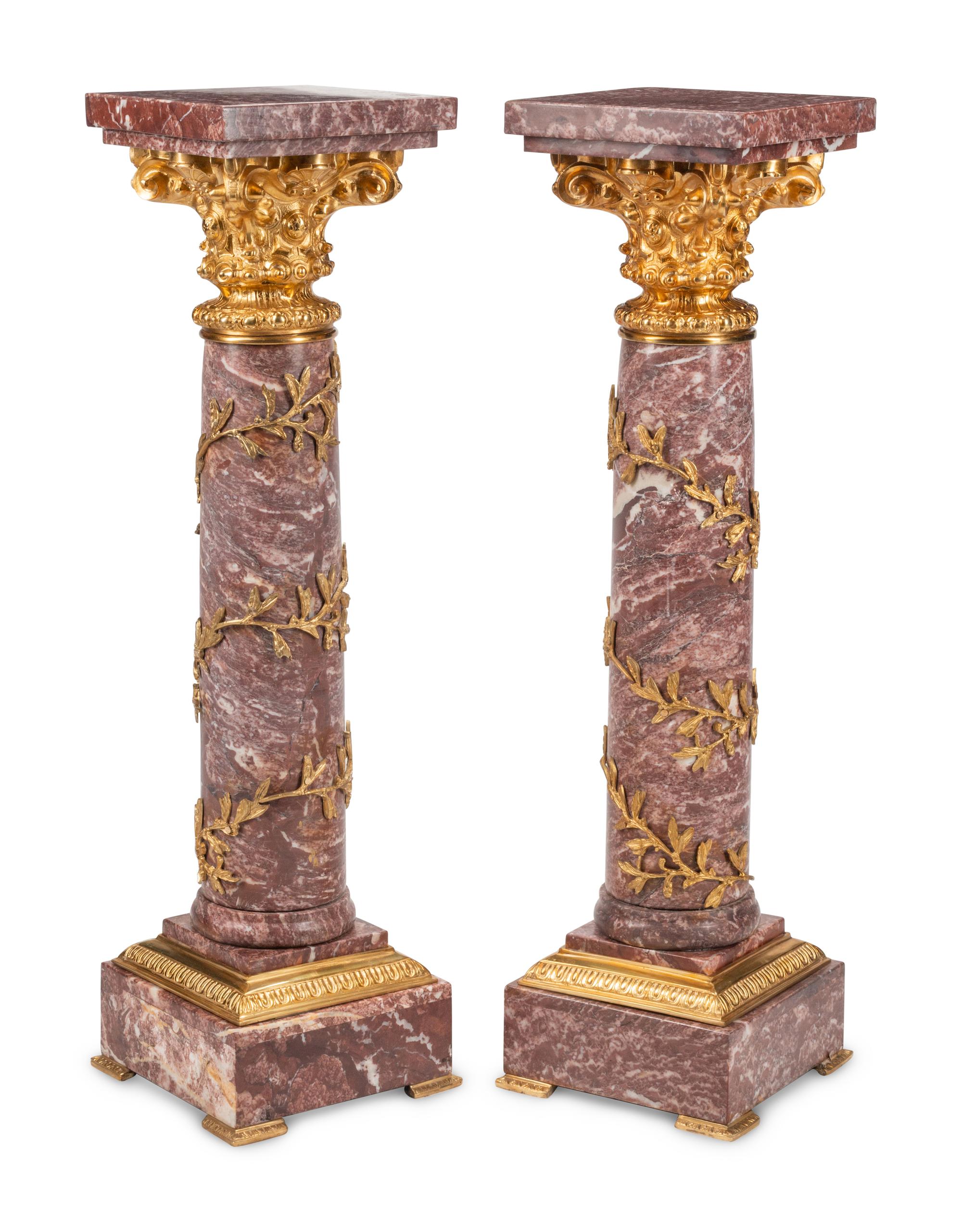 A Pair of Continental Gilt Bronze Mounted Marble Pedestals