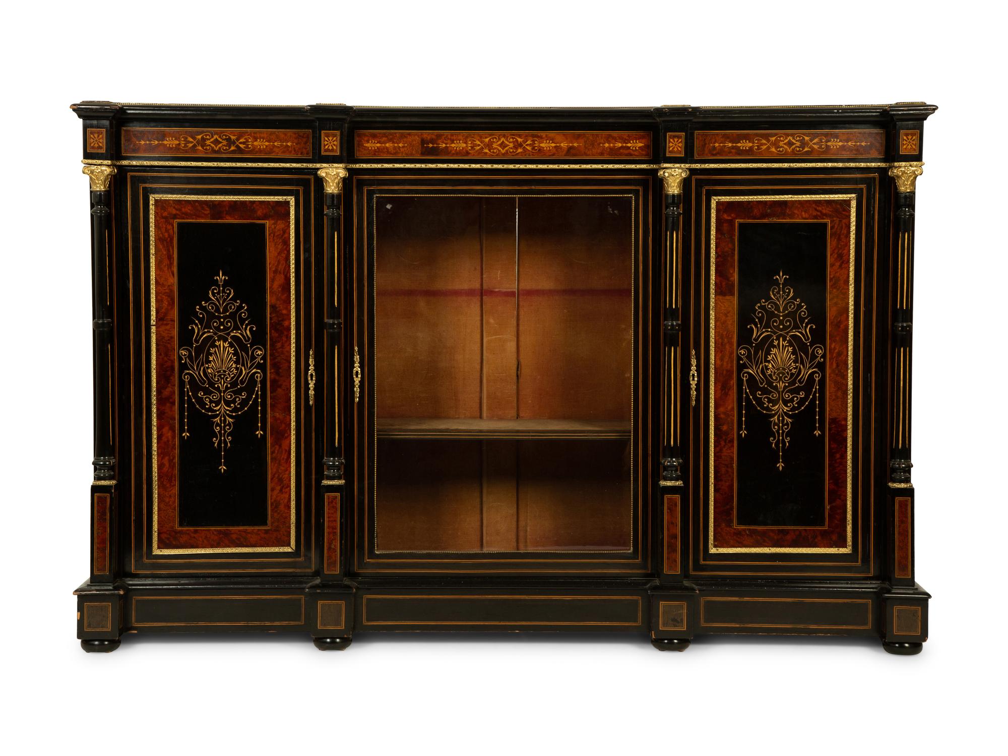 A Napoleon III Gilt Bronze Mounted Marquetry, Burlwood and Ebonized Wood Breakfront Cabinet — CIRCA 1870