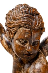 A Pair of Continental Carved Oak Cherubs