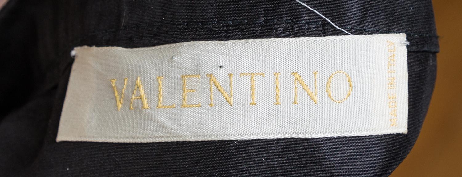 A Valentino Black Taffeta Pleated Halter Gown, Size 10.