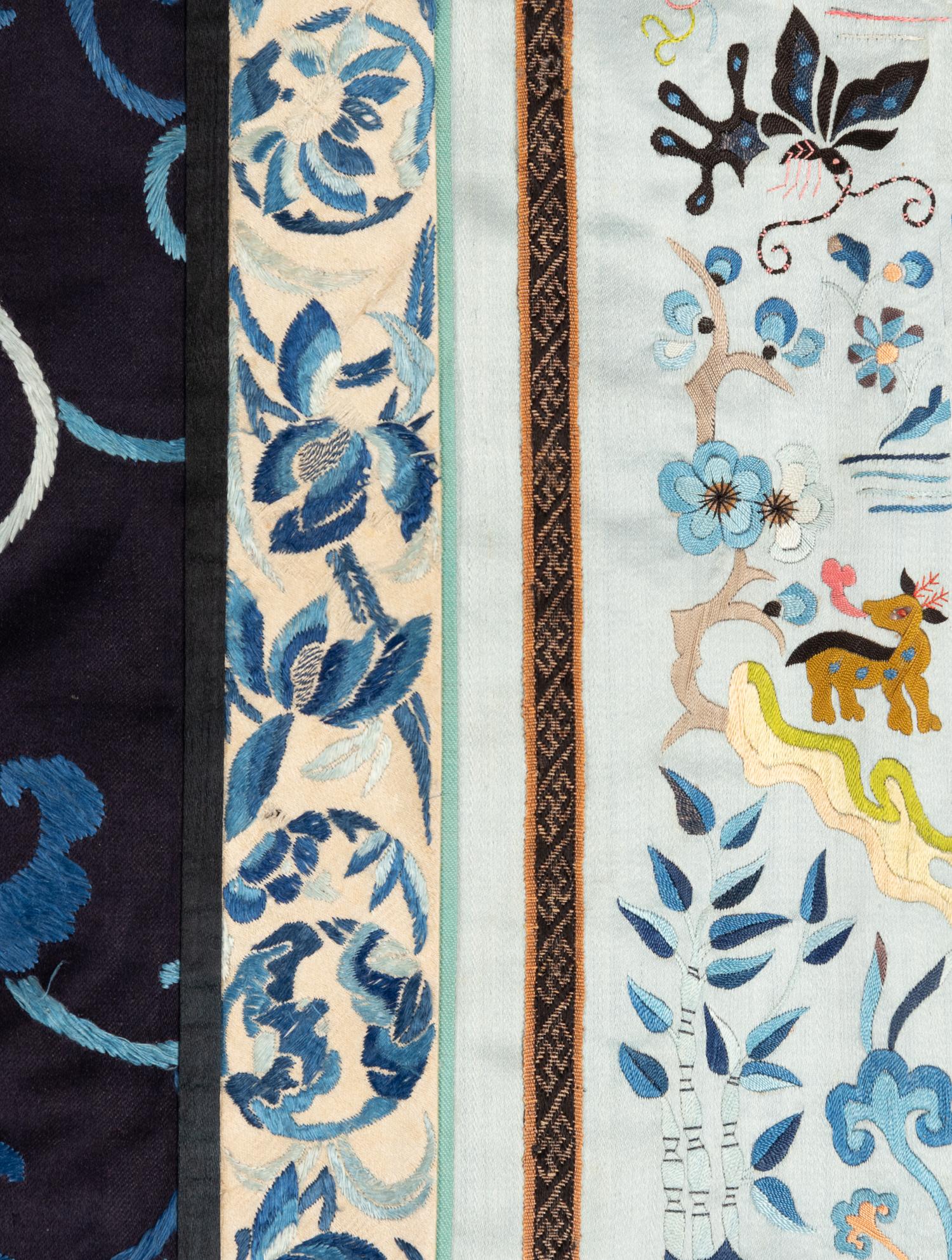 Two Black Ground Embroidered Silk Lady's Robes