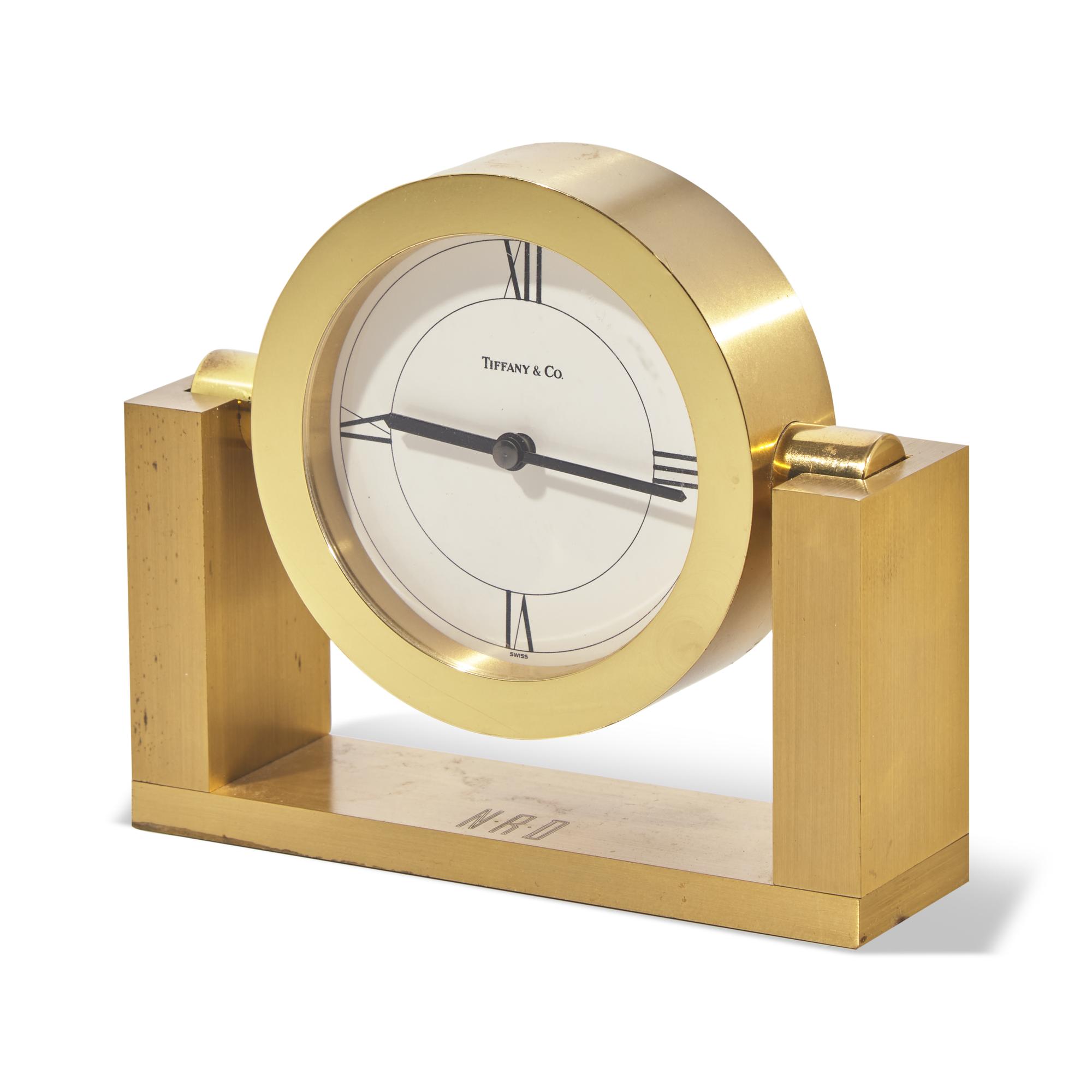 A Tiffany & Co. Brass 'Swing' Desk Clock Engraved 'NRD'
