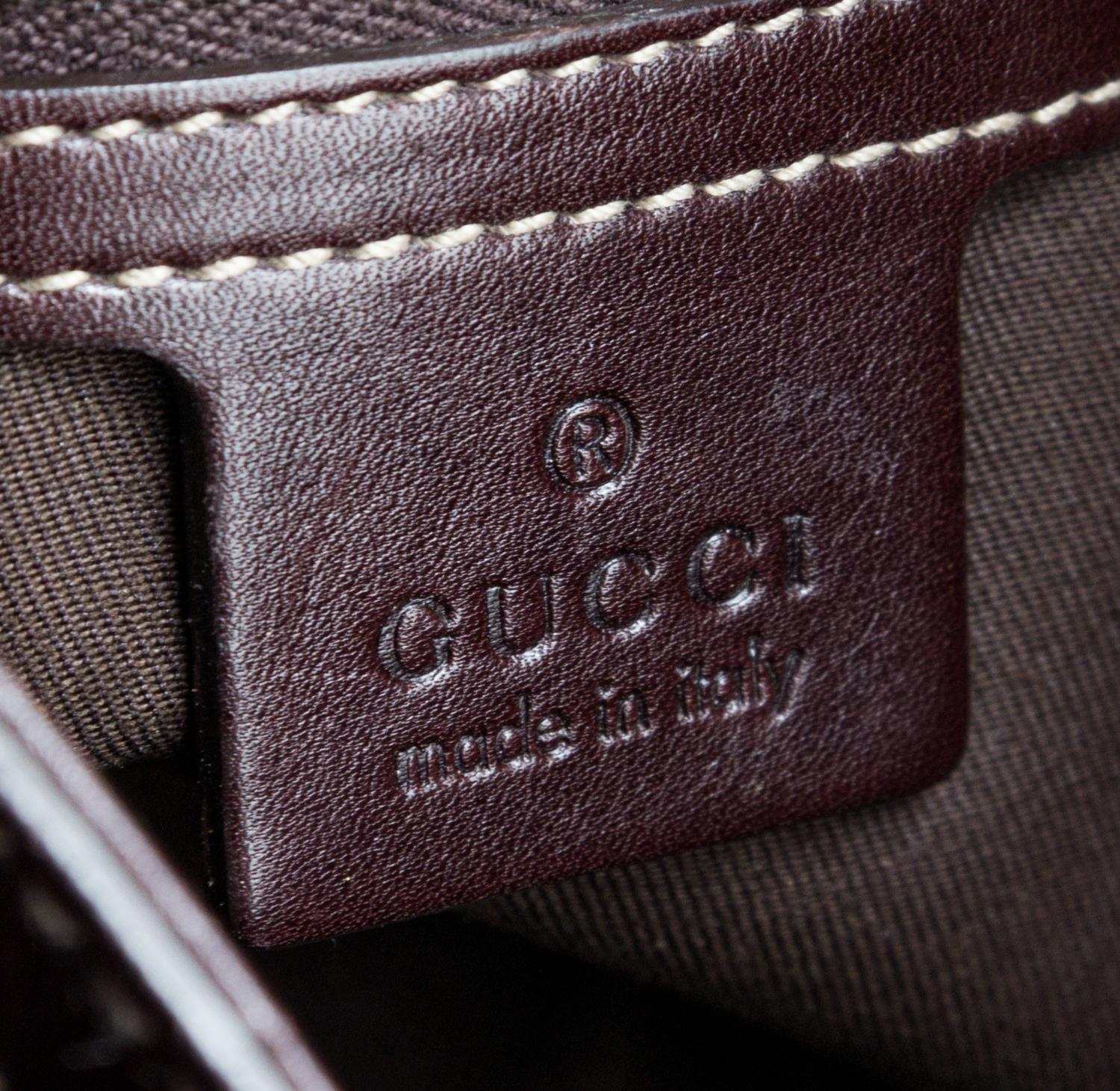 A Gucci Brown Leather Shoulder Bag, 16" x 11.5" x .5".