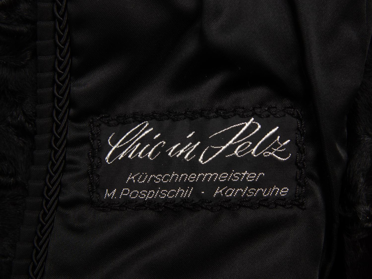 A Broadtail Skirt Suit
