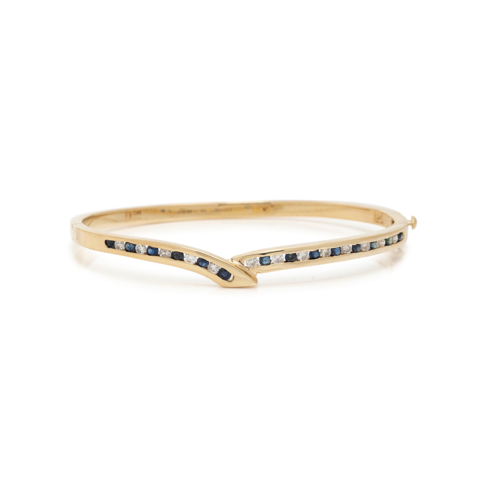 YELLOW GOLD, DIAMOND AND SAPPHIRE BANGLE BRACELET