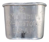 [MILITARIA]. World War II and Korean War-era canteens, canteen covers, and mess kits.
