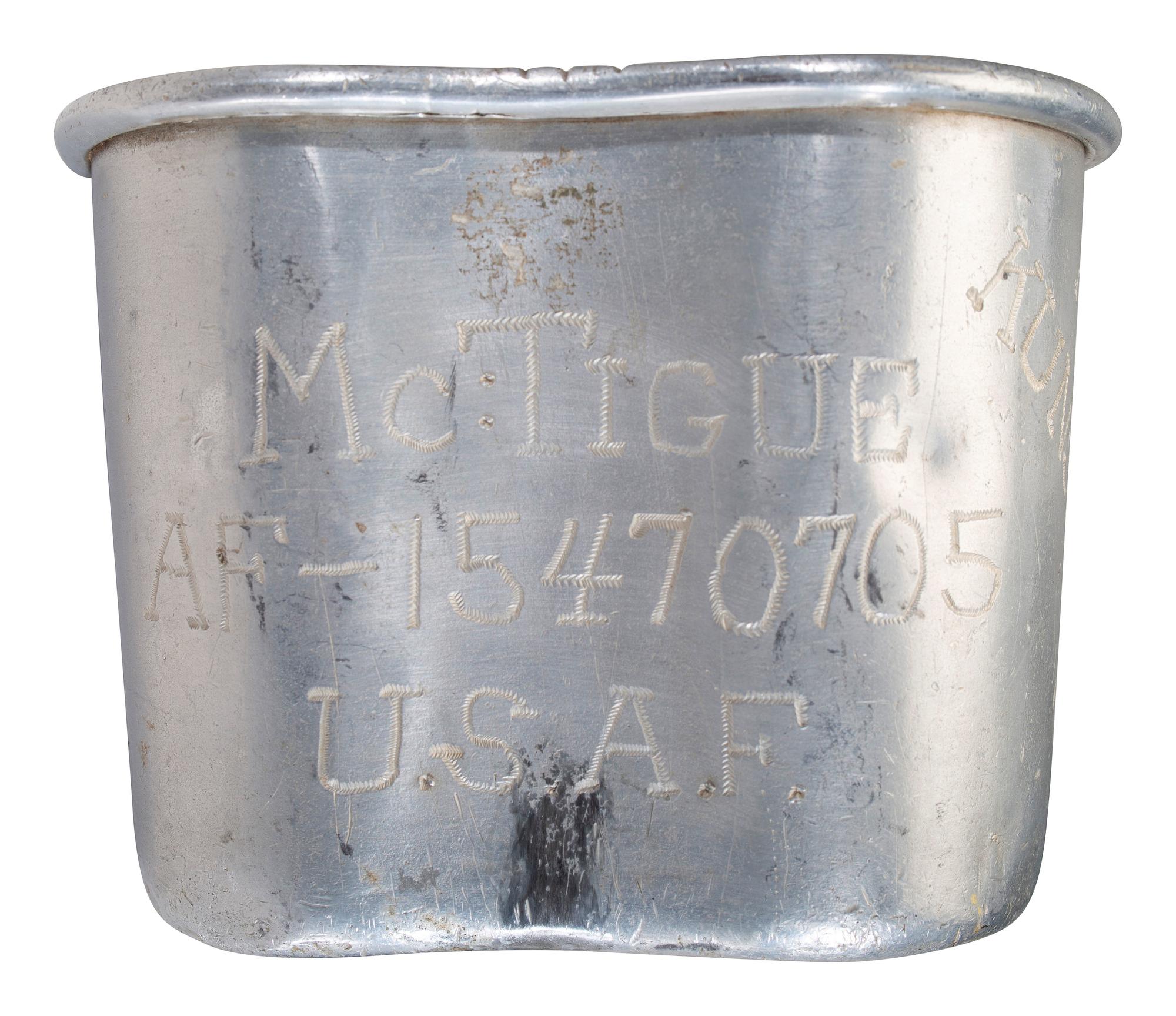 [MILITARIA]. World War II and Korean War-era canteens, canteen covers, and mess kits.
