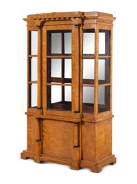 A German or Austrian Neoclassical Parcel Ebonized Birch Breakfront Vitrine Cabinet