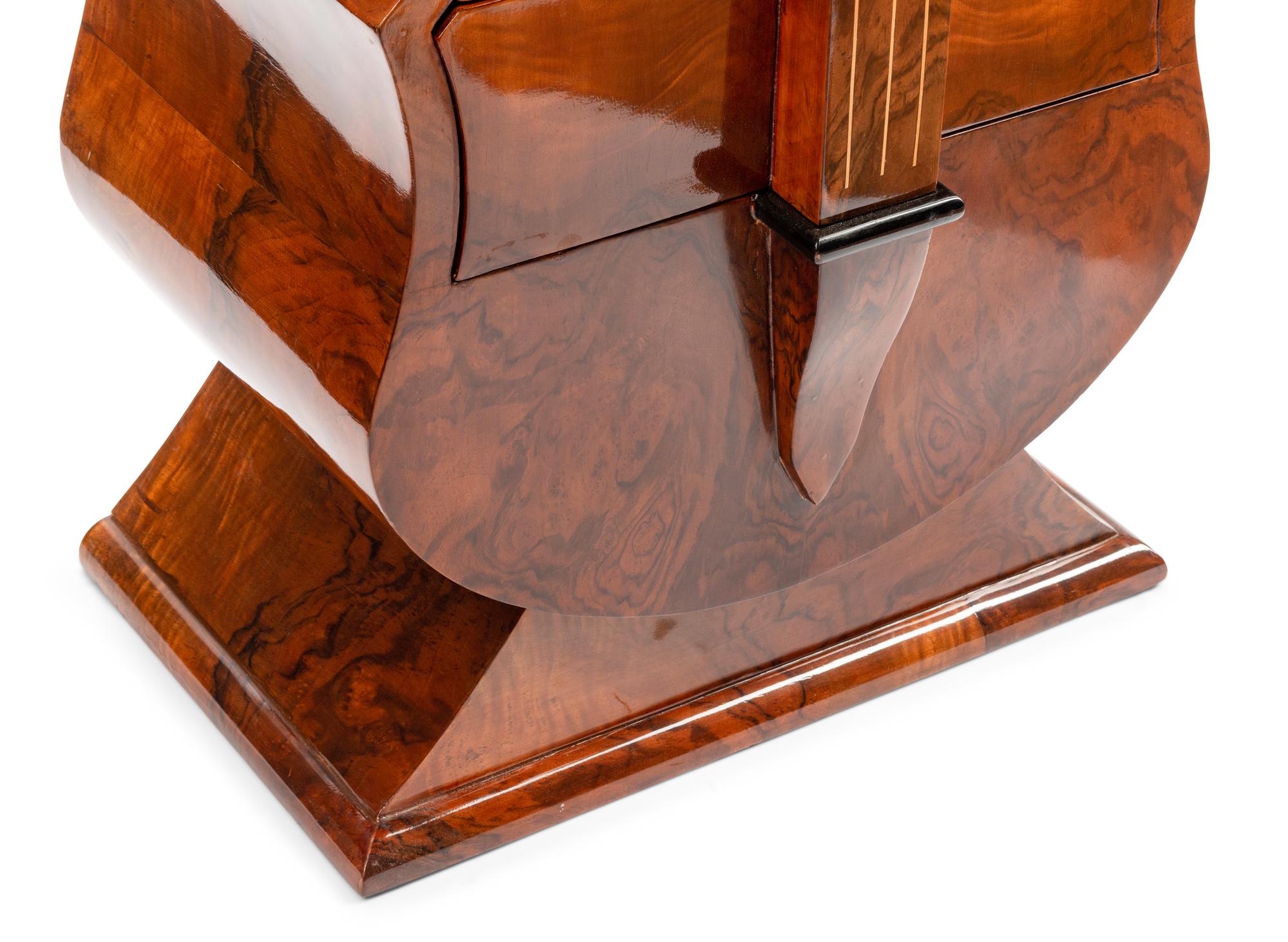 A Continental Burl Walnut "Cello" Cabinet
