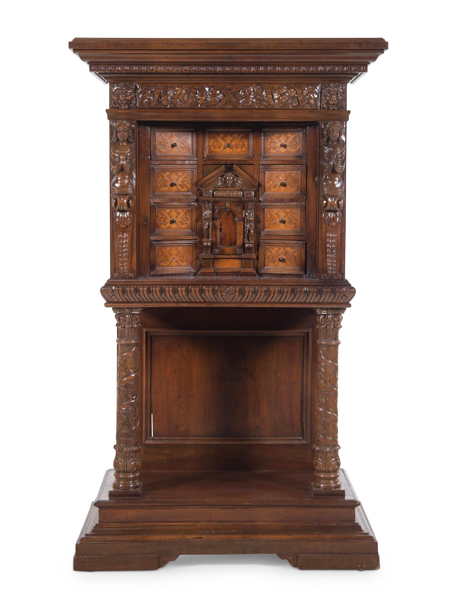 A Renaissance Revival Carved Walnut and Marquetry Collector's Cabinet