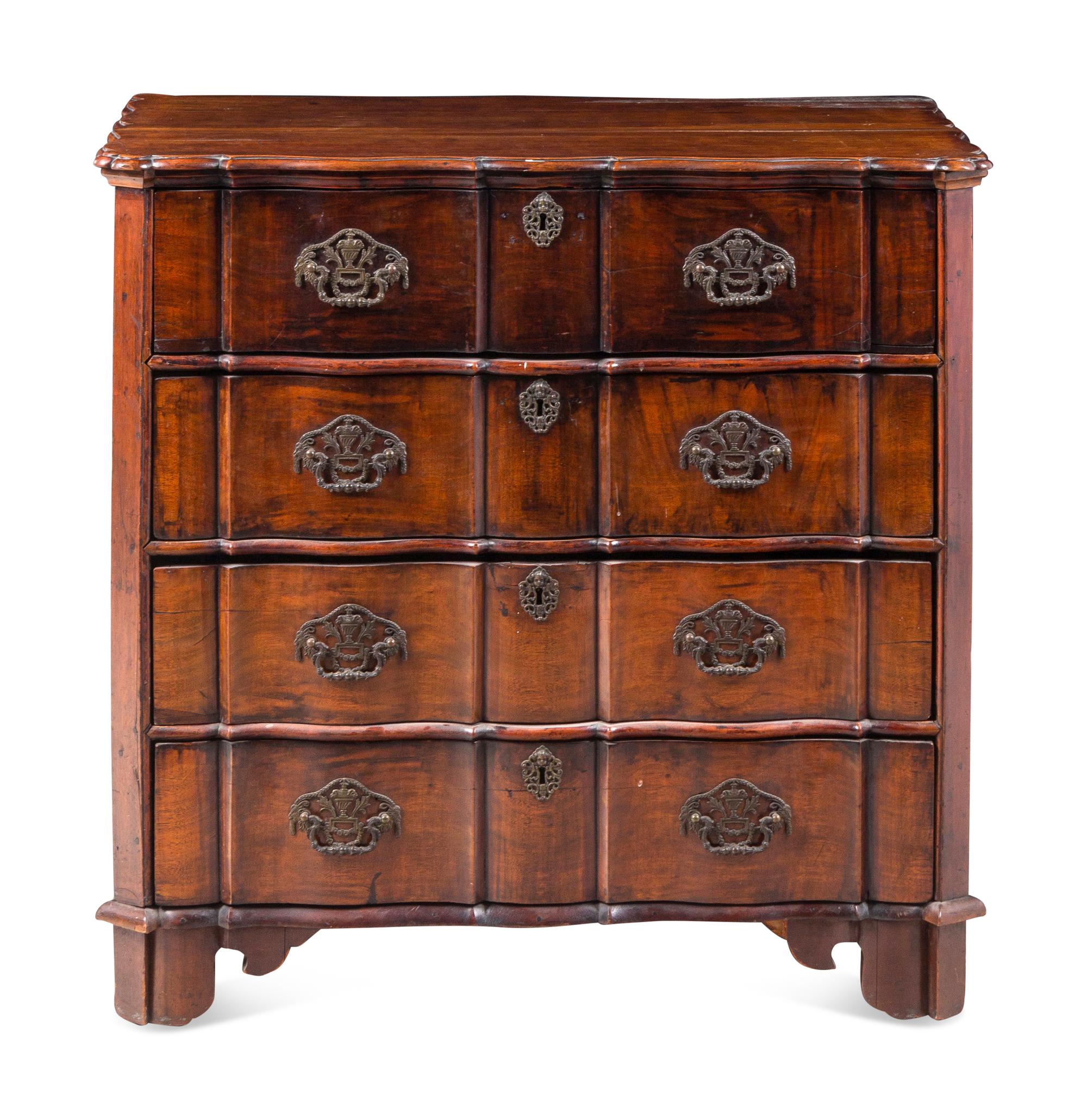 A Dutch Walnut Serpentine-Front Chest of Drawers