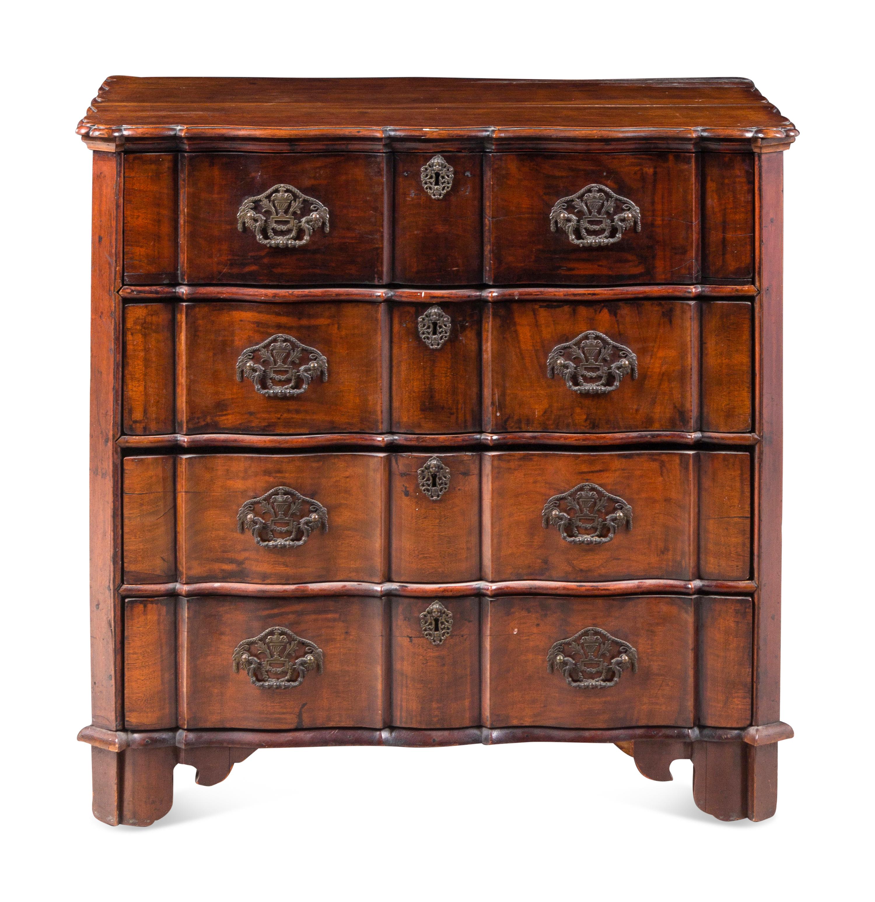 A Dutch Walnut Serpentine-Front Chest of Drawers