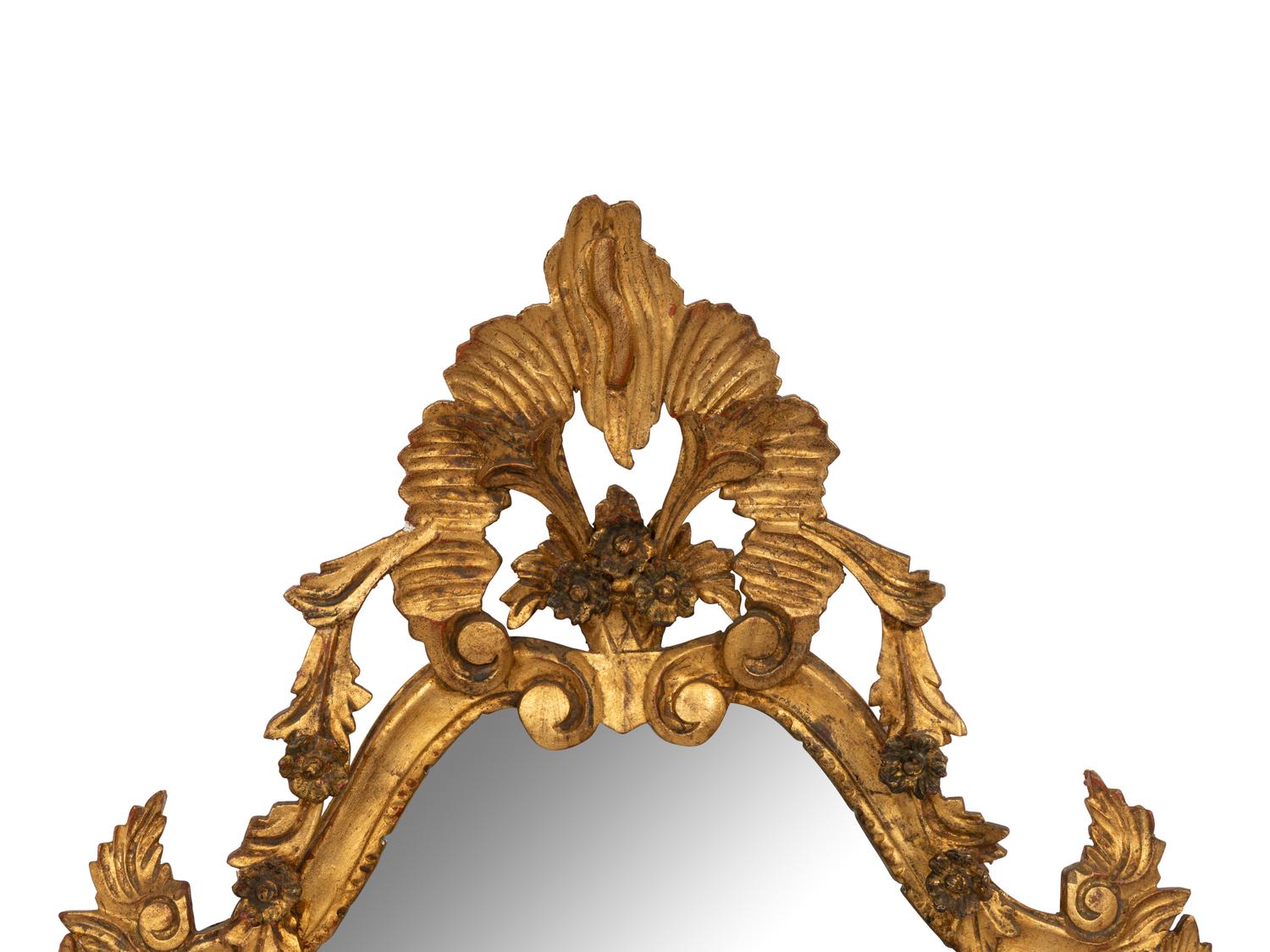An Italian Baroque Style Giltwood Mirror