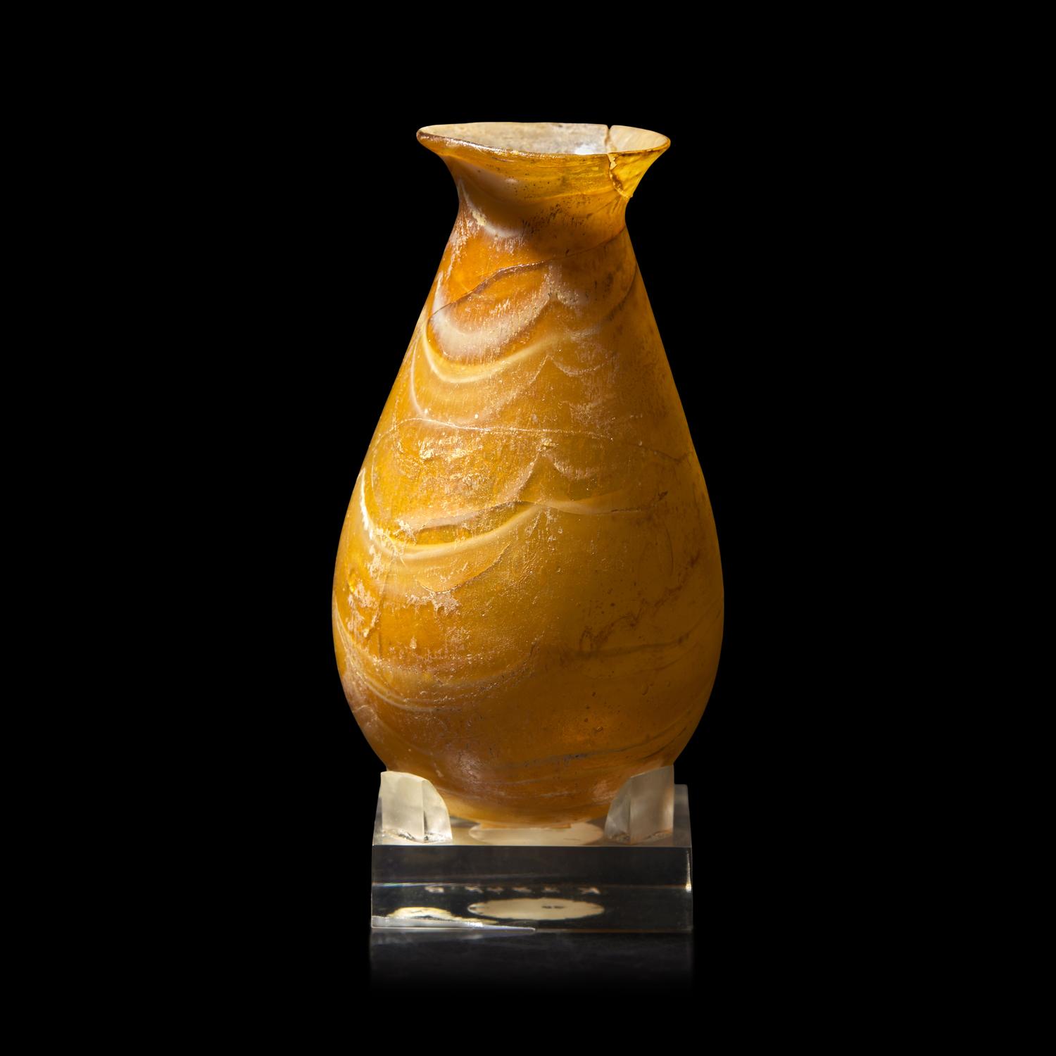 A Roman Amber Marbled Glass Flask