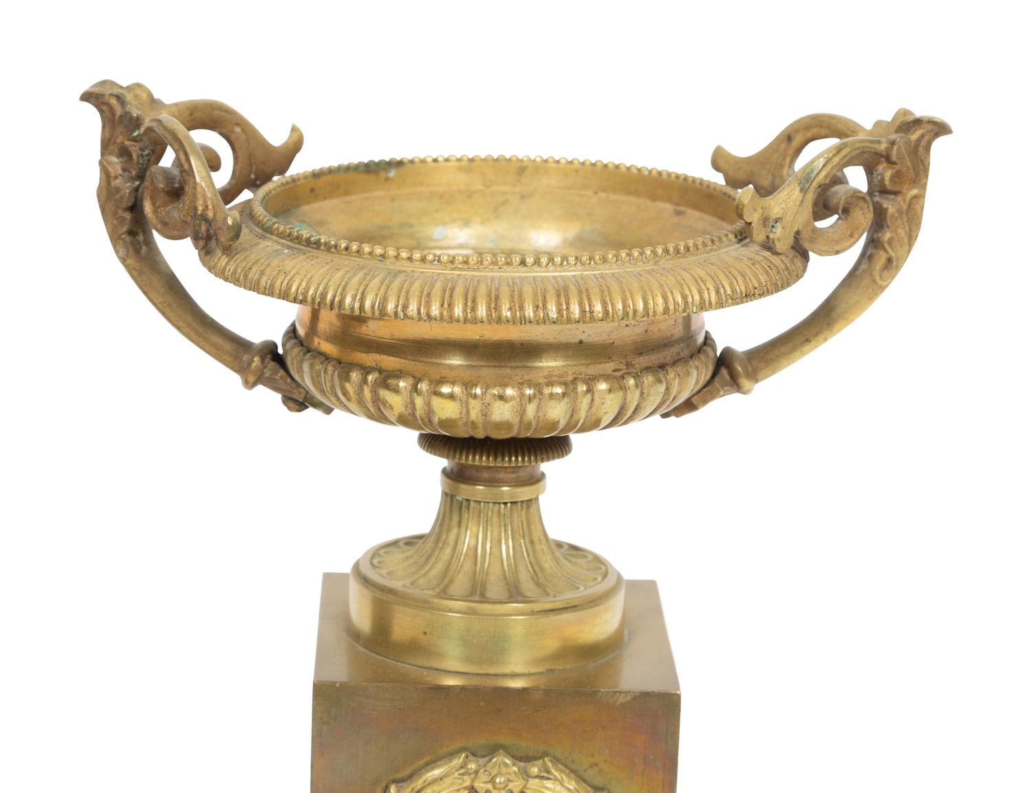 A Pair of Empire Gilt Bronze Urns on Pedestal Bases