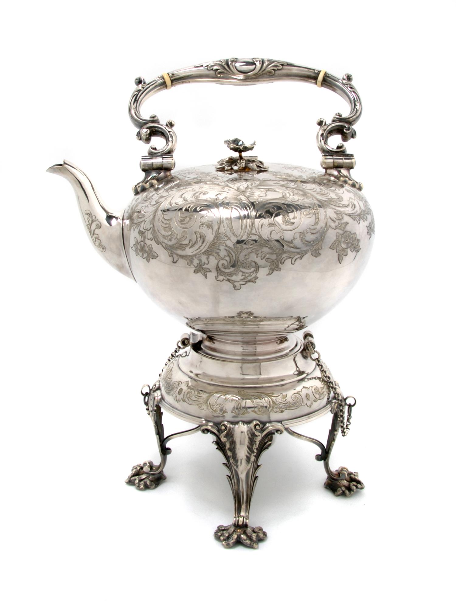 A English Silverplate Teapot on Stand, Birmingham, Height overall 16 1/4 inches.