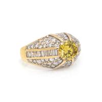 TREATED FANCY VIVID YELLOW DIAMOND AND DIAMOND RING