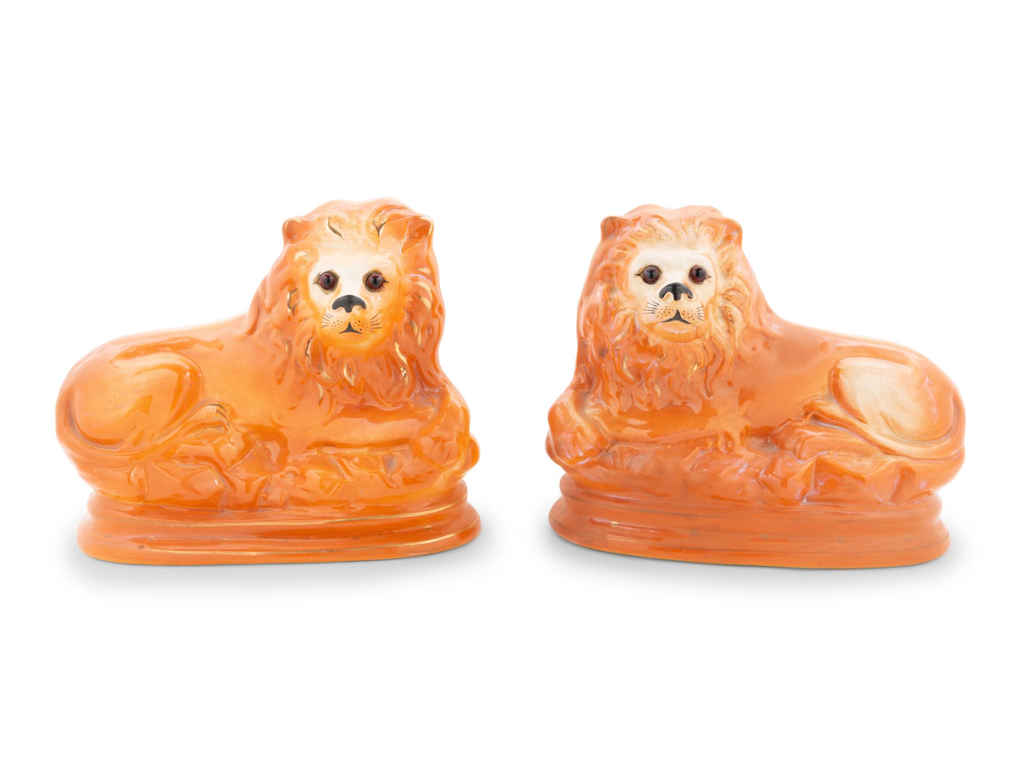 A Collection of Staffordshire Lions and Dogs