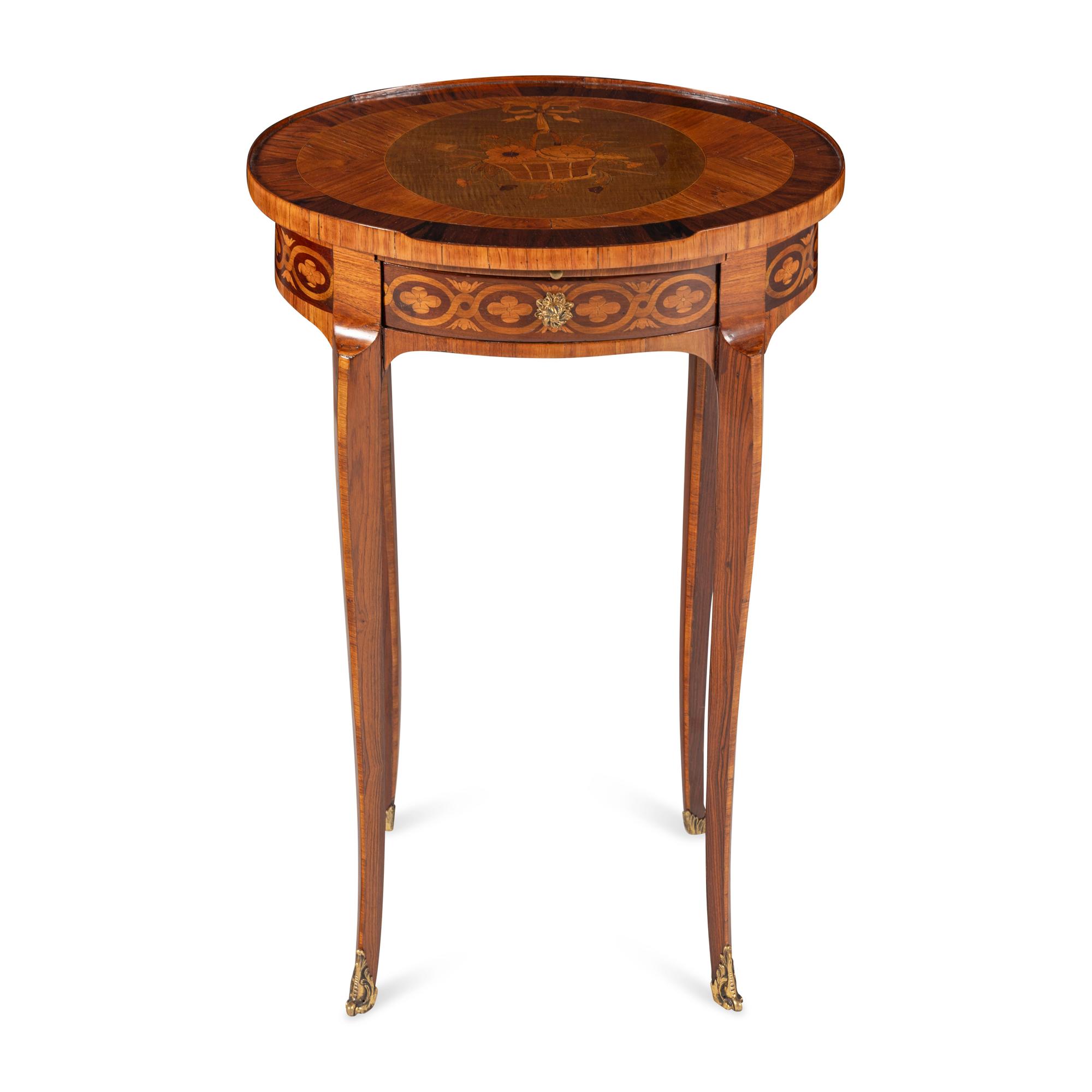 A Louis XVI Style Kingwood and Marquetry Writing Table