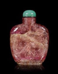 A Tourmaline 'Dragon and Phoenix' Snuff Bottle