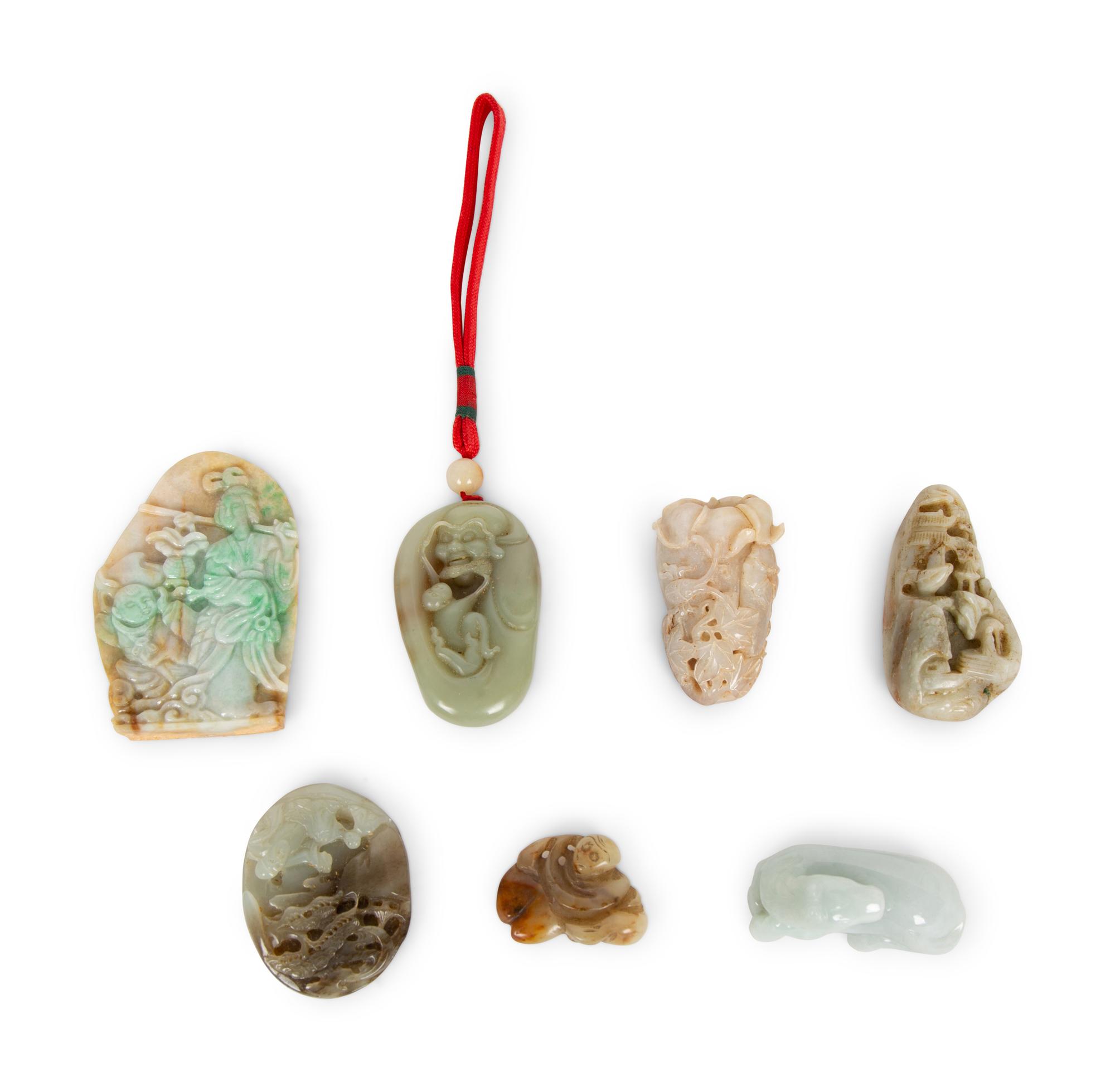 A Collection of Seven Carved Jadeite Figures — 20TH CENTURY