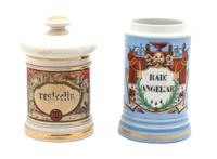 Two Continental Porcelain Apothecary Jars Height of taller 11 inches.