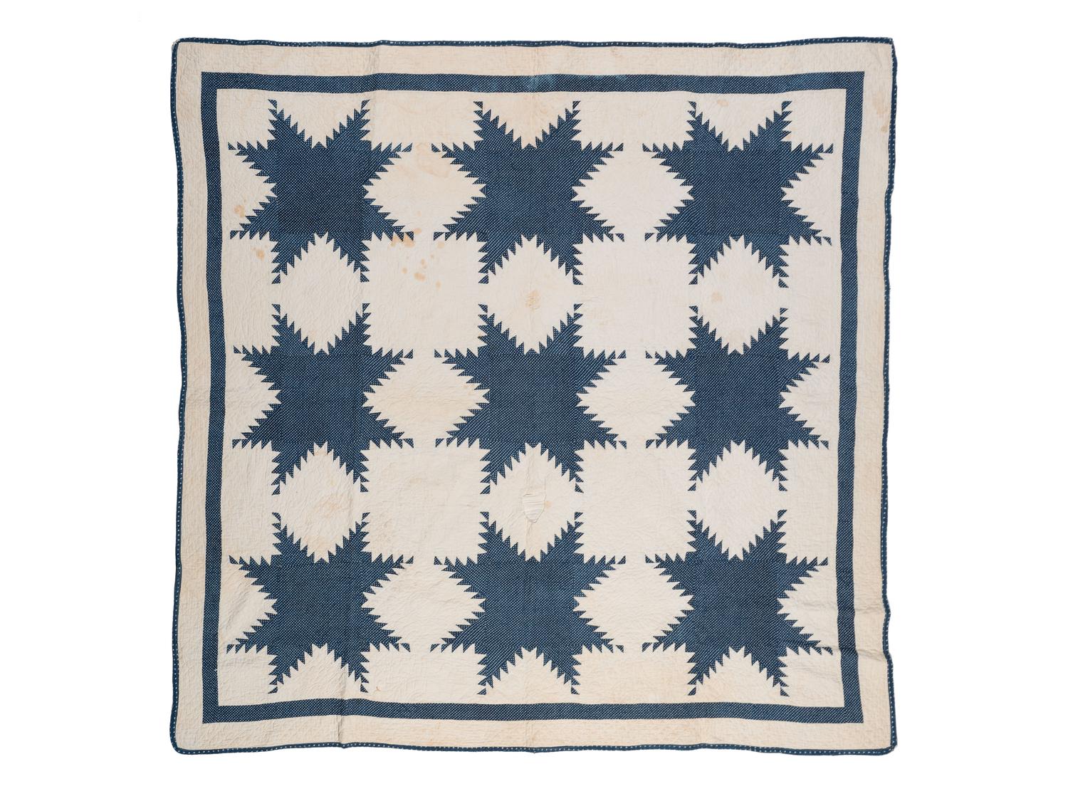 Two Blue and White Pieced Quilts