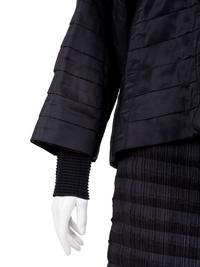 Three Issey Miyake Pleated Items: One Jacket, One Top, and One Skirt