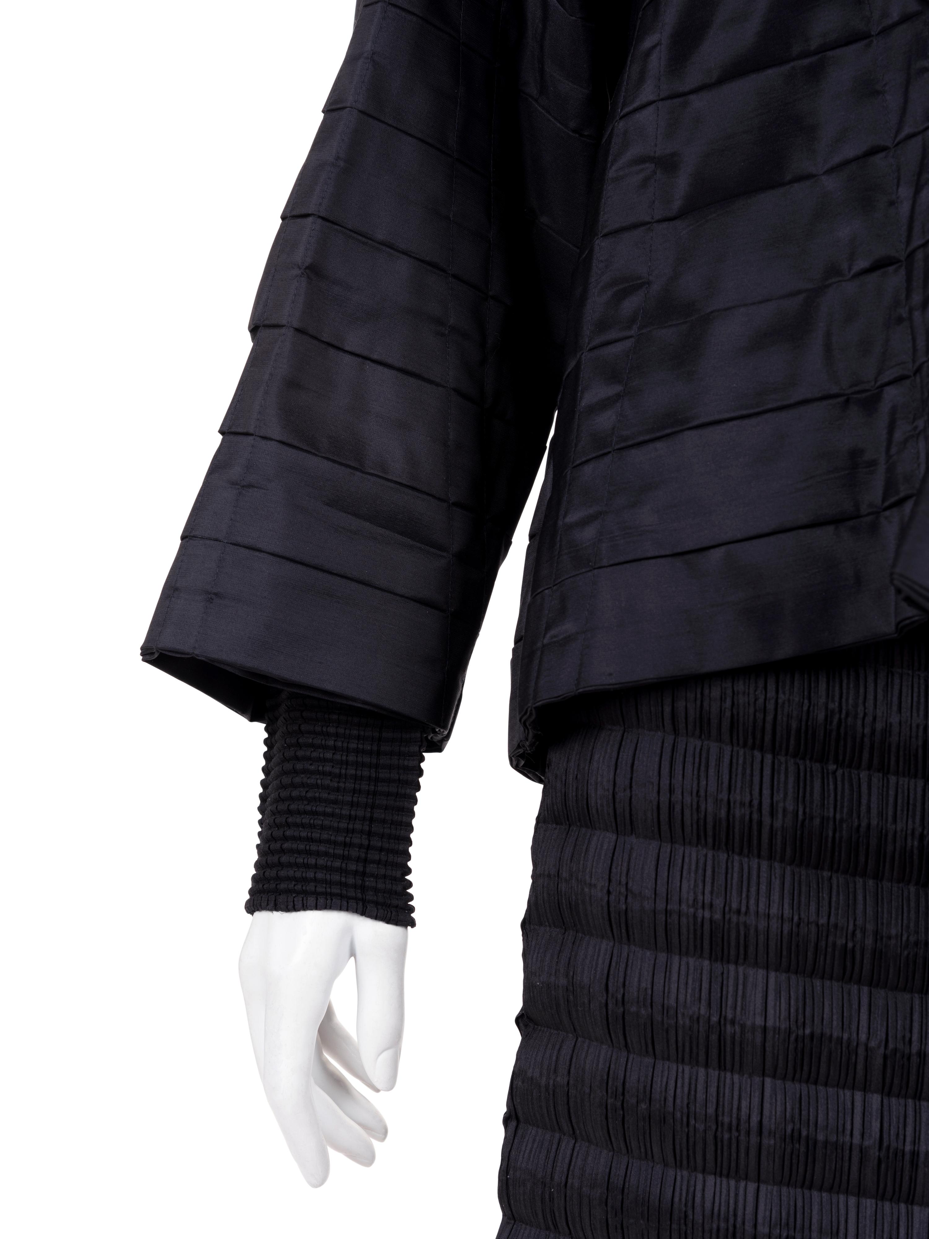 Three Issey Miyake Pleated Items: One Jacket, One Top, and One Skirt