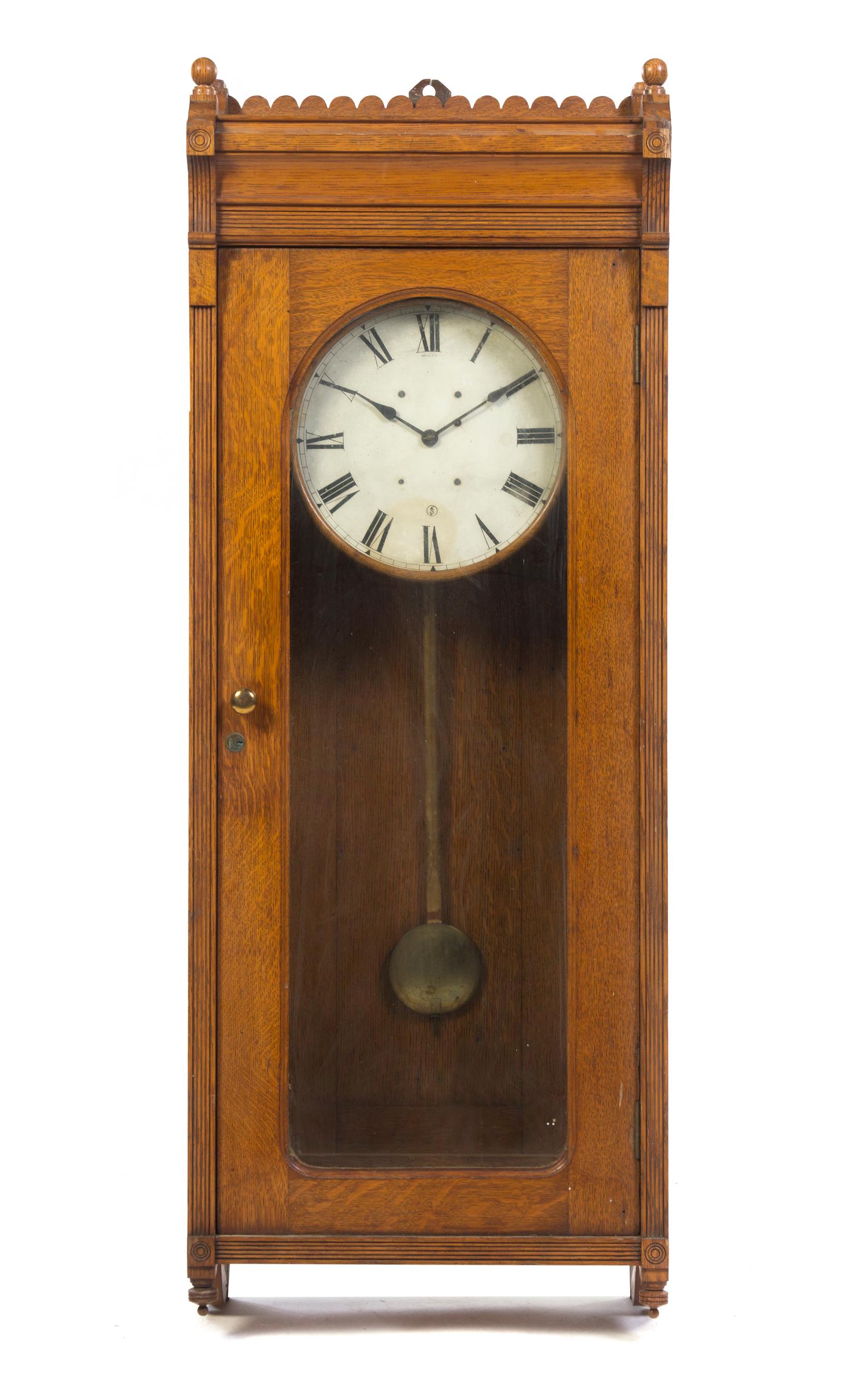 An American Oak Regulator Clock, Height 57 1/4 inches.