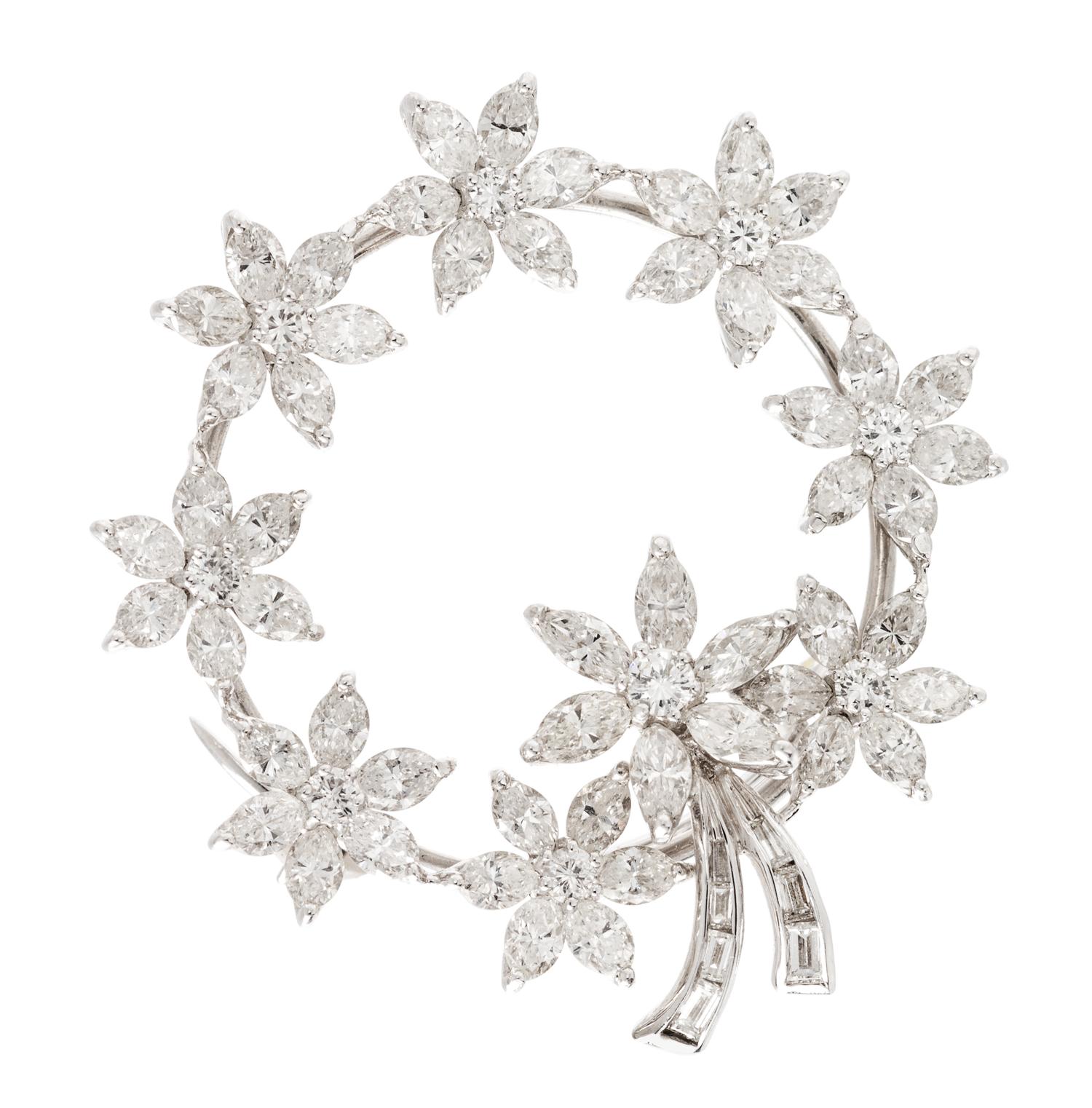 A 14 Karat White Gold and Diamond Circle Brooch, 7.50 dwts.
