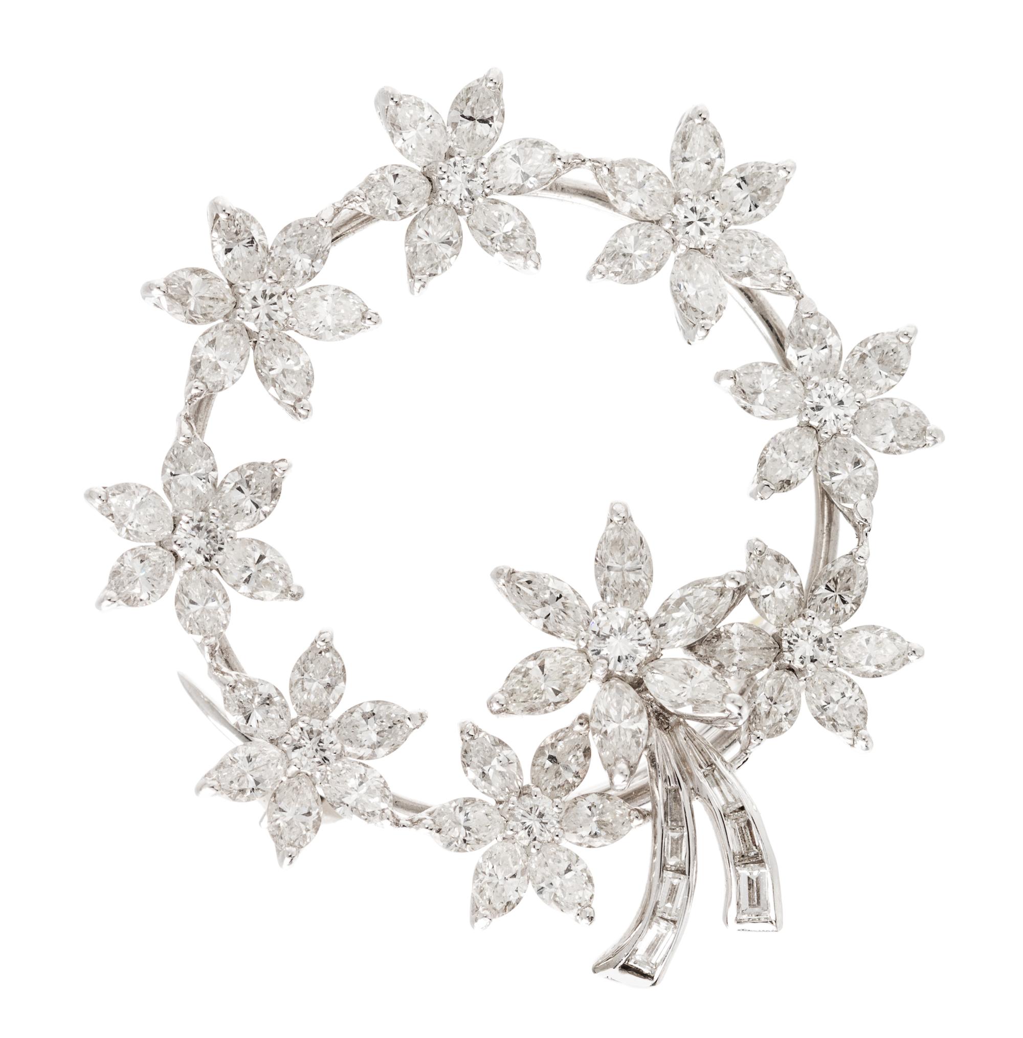 A 14 Karat White Gold and Diamond Circle Brooch, 7.50 dwts.
