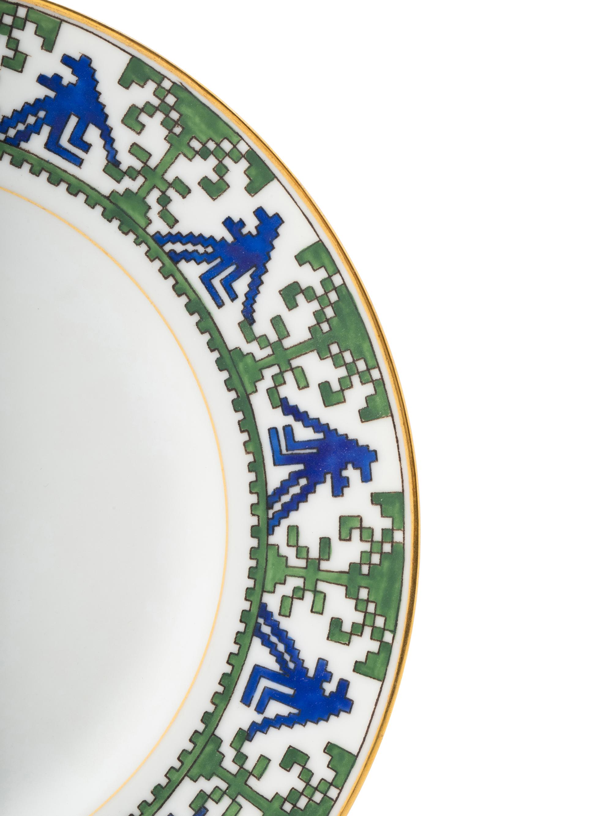 A Set of Four of Kornilov Bros. Porcelain Dessert Plates