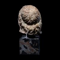A Roman Marble Head of a God