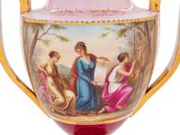 A Pair of Vienna Painted Porcelain Covered Urns and Stands