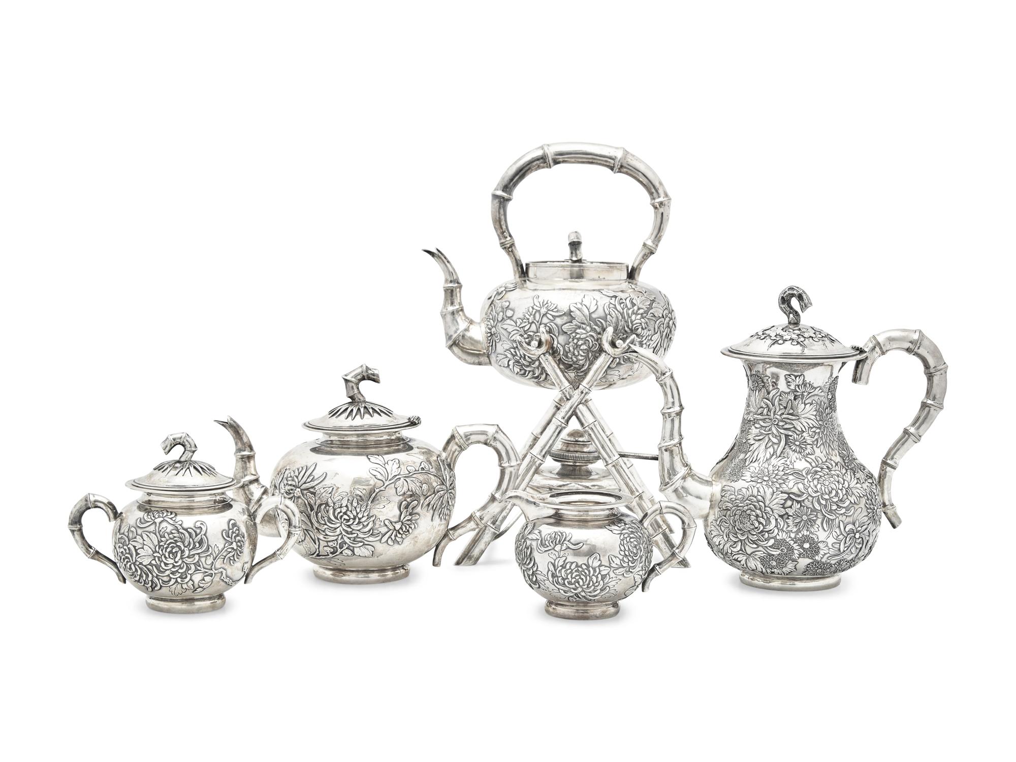 A Chinese Silver Five-Piece "Chrysanthemum" Repousse Tea and Coffee Service