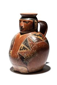 A Huari Man with Poncho Vessel